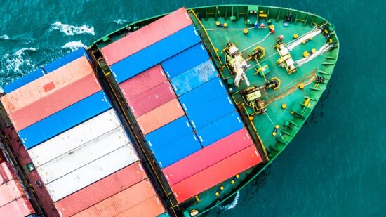 Aerial top view container cargo ship, Business logistic and transportation of International by ship in the open sea.